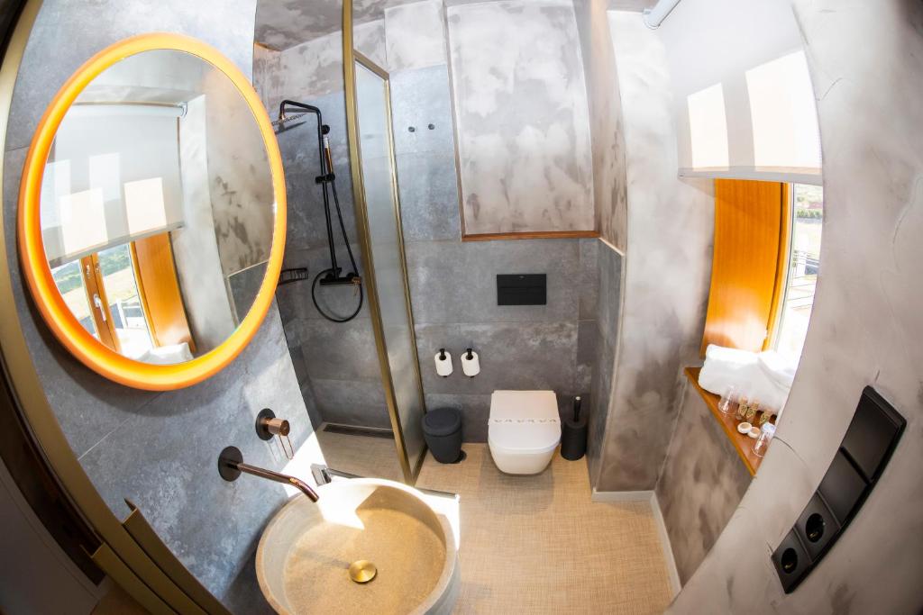 Koupelna v ubytování Hotel Faro Lariño
