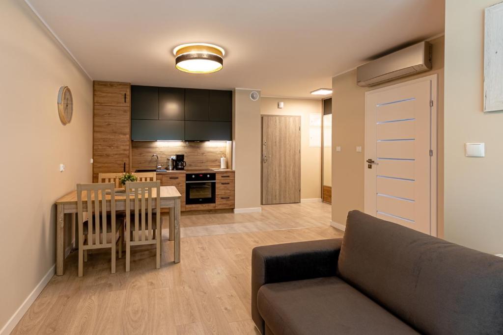 Posedenie v ubytovaní Przytulne Apartamenty Sun Seasons 24 z Pięknym Widokiem w Szklarskiej Porębie by Noclegi Renters