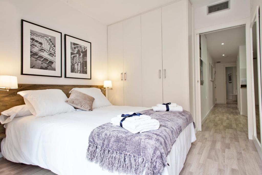 Posteľ alebo postele v izbe v ubytovaní Habitat Apartments Blanca