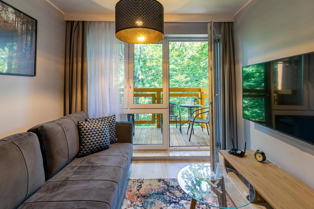 Posedenie v ubytovaní Przytulne Apartamenty Sun Seasons 24 z Pięknym Widokiem w Szklarskiej Porębie by Noclegi Renters