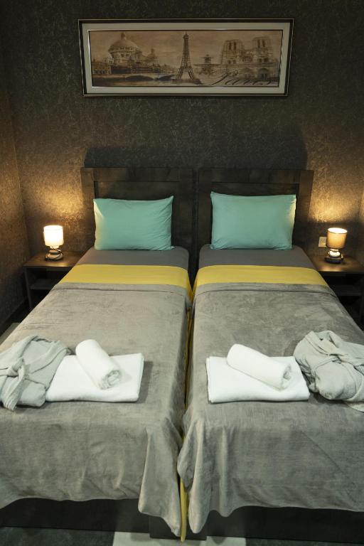 Postel nebo postele na pokoji v ubytování Batumi West Hotel
