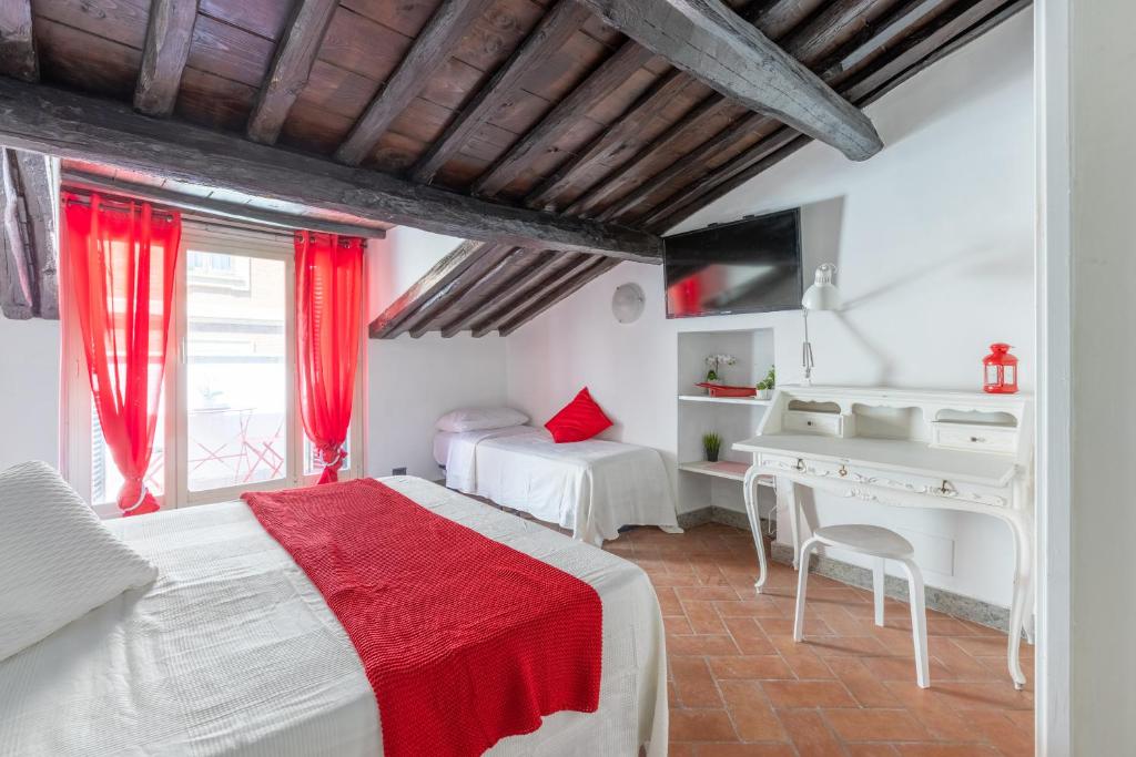 En eller flere senge i et værelse på VG FONTANA DI TREVI - 5 STELLE Camera con balcone