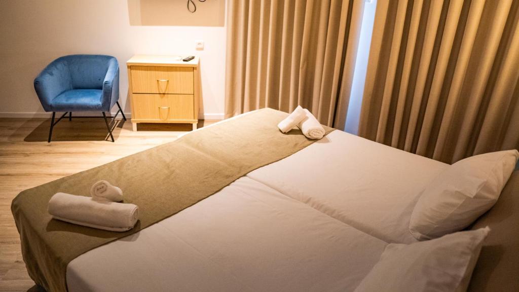 Postel nebo postele na pokoji v ubytování Acco Beach Hotel