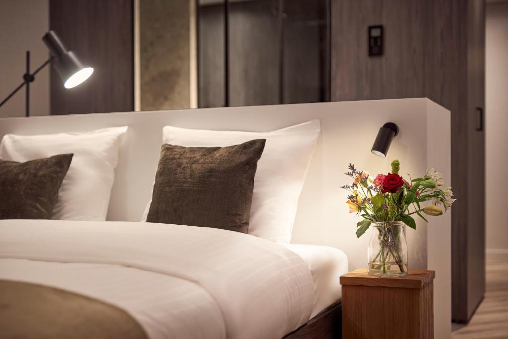 Postel nebo postele na pokoji v ubytování Van der Valk Hotel Beveren