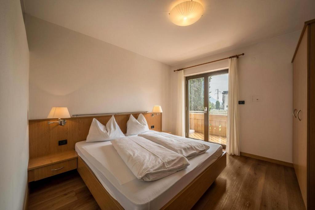 Postel nebo postele na pokoji v ubytování Weinsepphof Ferienwohnung 3