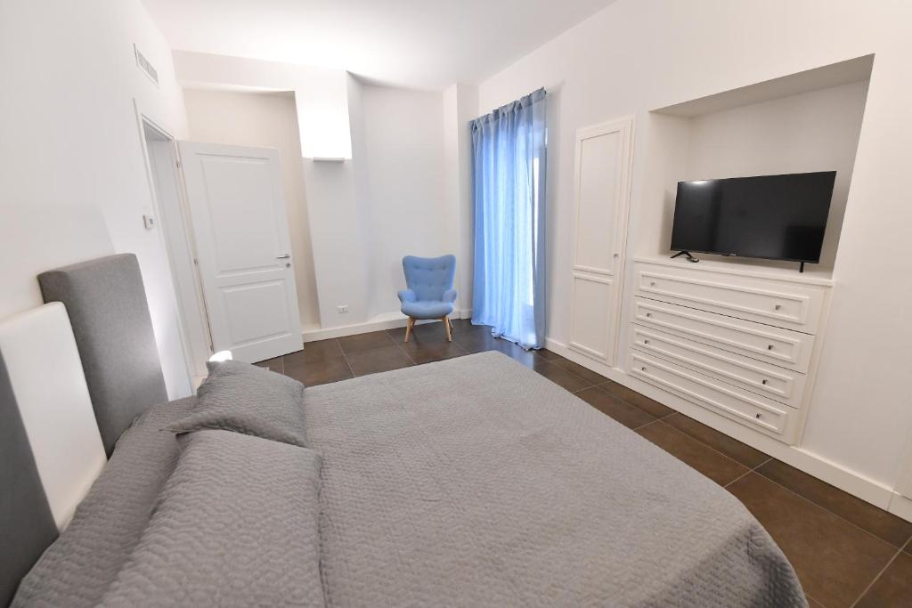 TV a/nebo společenská místnost v ubytování Palazzo degli Stemmi