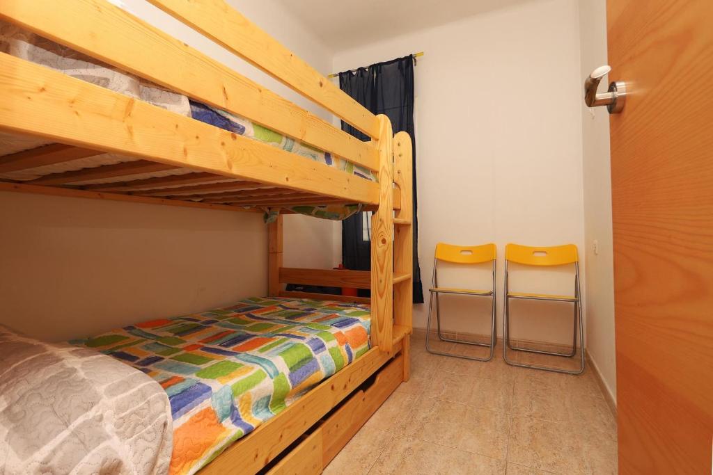 Postel nebo postele na pokoji v ubytování AT174 Apartamento en segunda línea de la playa, wifi