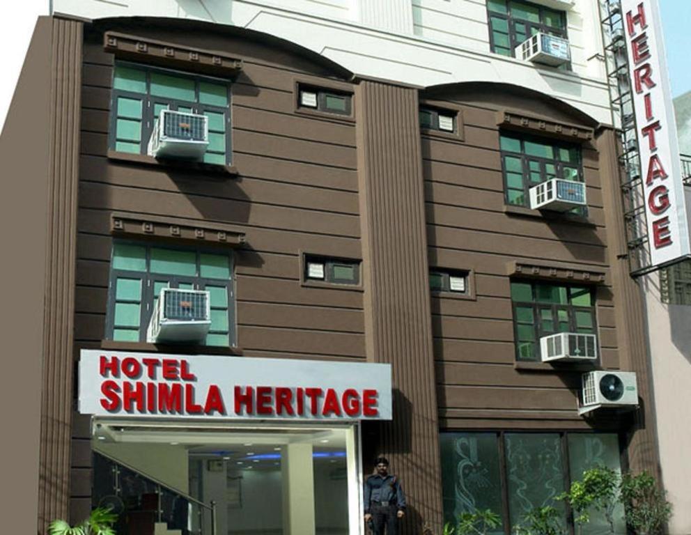 a hotel shimla neerride sign in front of a building at Hotel SHIMLA HERITAGE- Near B L K Hospital in New Delhi