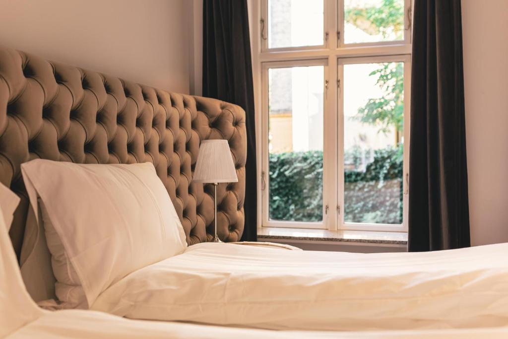 Postel nebo postele na pokoji v ubytování A Hotels City
