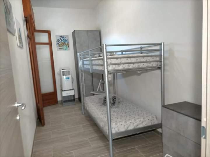 Postel nebo postele na pokoji v ubytování Casa Vacanze Samuel Beach