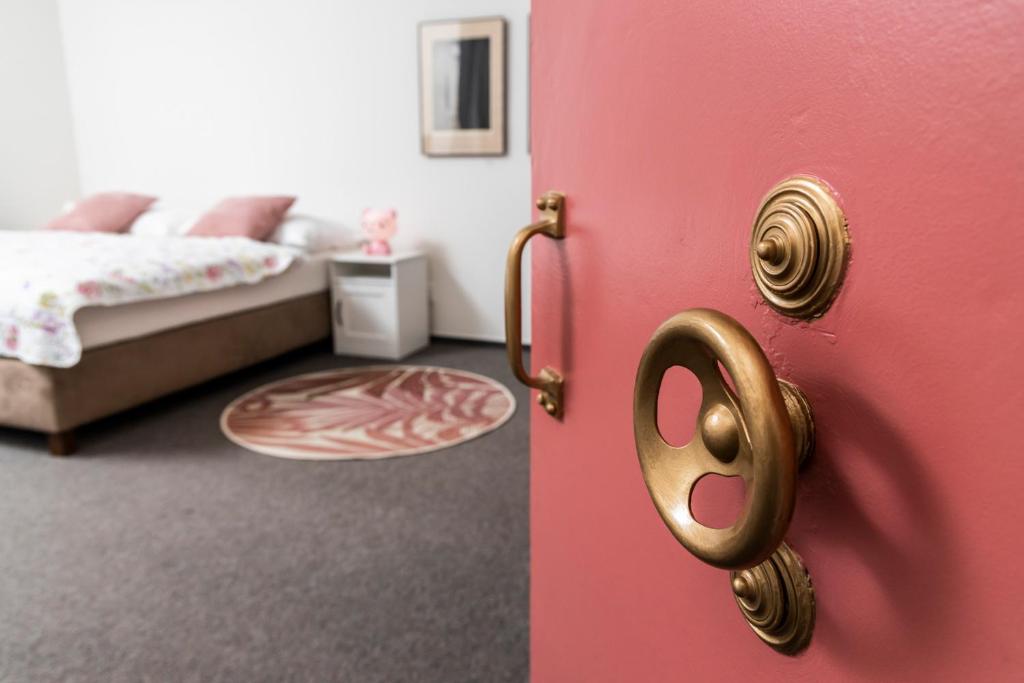 Postel nebo postele na pokoji v ubytování APARTMÁNY VILA LIBĚNA