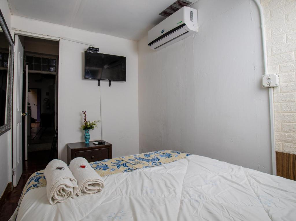 Uma cama ou camas num quarto em Hostel the pod 33