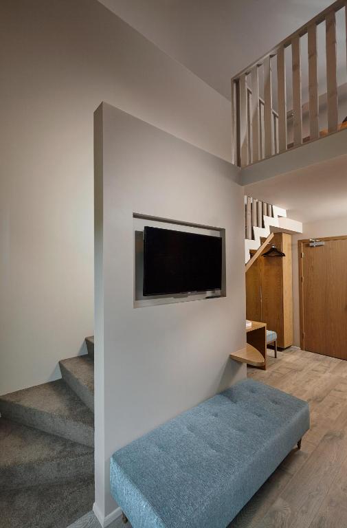 Televiisor ja/või meelelahutuskeskus majutusasutuses Hotel Vík í Mýrdal