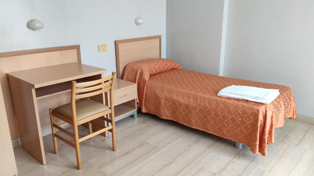 Postel nebo postele na pokoji v ubytování SAN JUAN DE RIBERA, Casa per Ferie