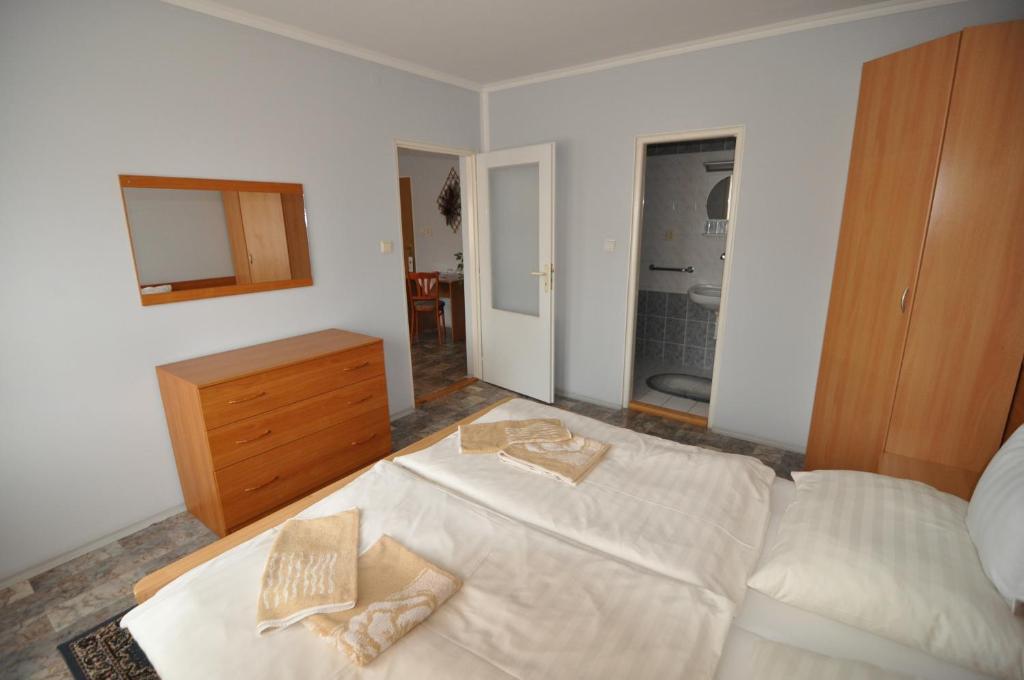 Postel nebo postele na pokoji v ubytování Hotel Átrium