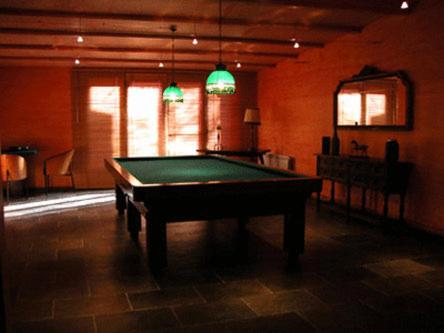 a room with a pool table in a room at Masia Vista Hermosa in Vallromanes
