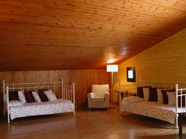 Postel nebo postele na pokoji v ubytování Masia Vista Hermosa