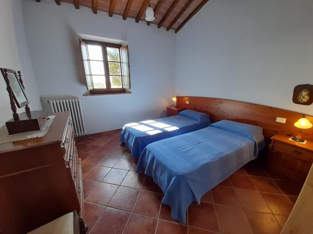 Postel nebo postele na pokoji v ubytování Borgo Beccanella