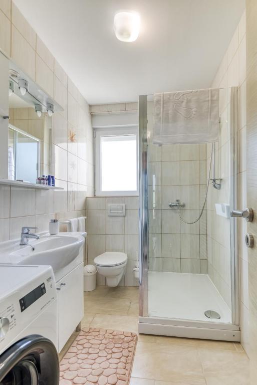Kúpeľňa v ubytovaní Apartmani Leptir