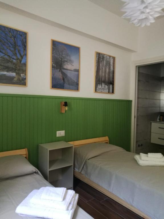 Postel nebo postele na pokoji v ubytování Ai Cerri di Remí