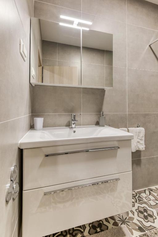 Kúpeľňa v ubytovaní Apartmani Leptir