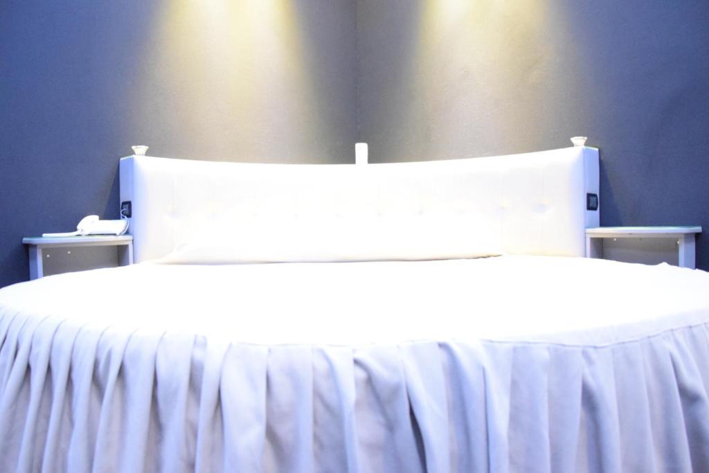 Posteľ alebo postele v izbe v ubytovaní Fly Boutique Hotel