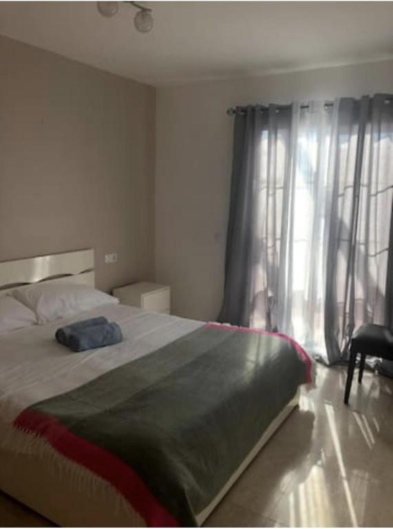 Postel nebo postele na pokoji v ubytování Villa el Roque