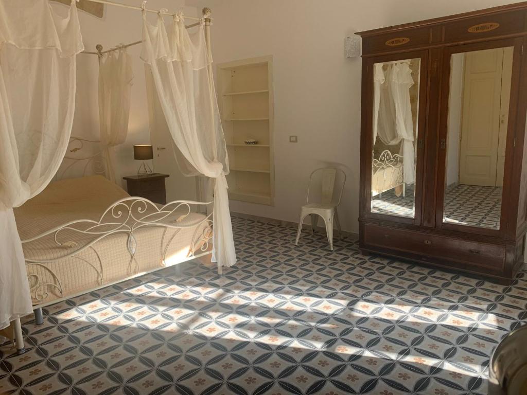 Łóżko lub łóżka w pokoju w obiekcie Charme in centro - Tourist rental