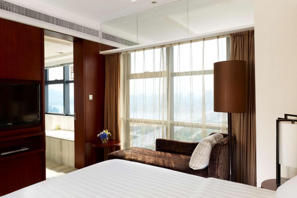 TV a/nebo společenská místnost v ubytování Radisson Blu Hotel Liuzhou