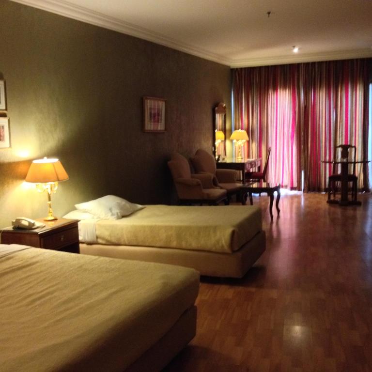 Postel nebo postele na pokoji v ubytování Amarante Pyramids Hotel
