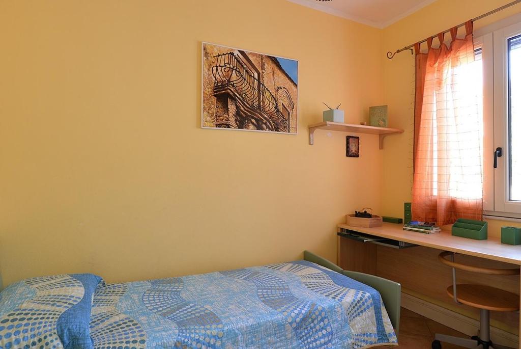 Łóżko lub łóżka w pokoju w obiekcie SUNSET HOUSE