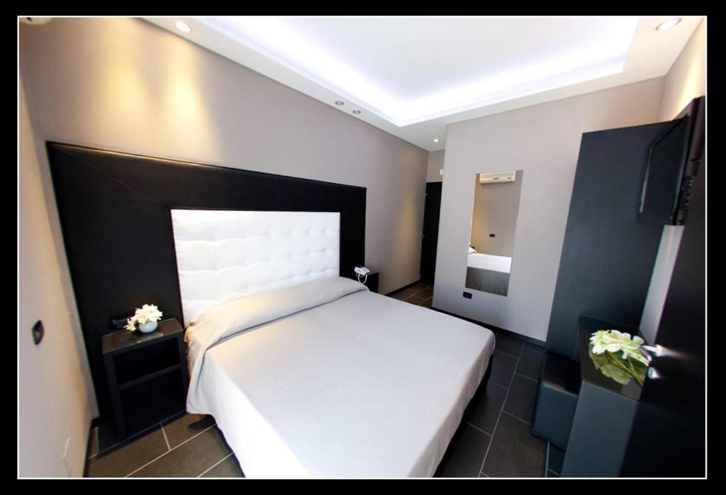 Posteľ alebo postele v izbe v ubytovaní Fly Boutique Hotel