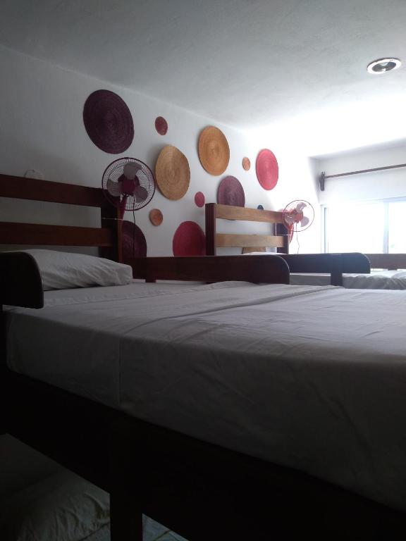 Postel nebo postele na pokoji v ubytování Hostal Jardin
