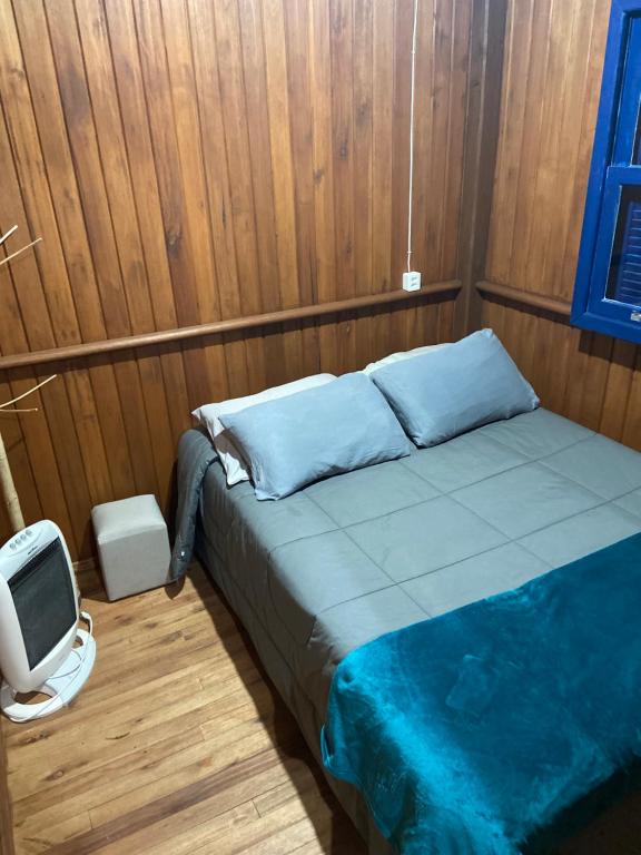 Tempat tidur dalam kamar di CASA DE CAMPO FAZENDA DAS PELOTAS