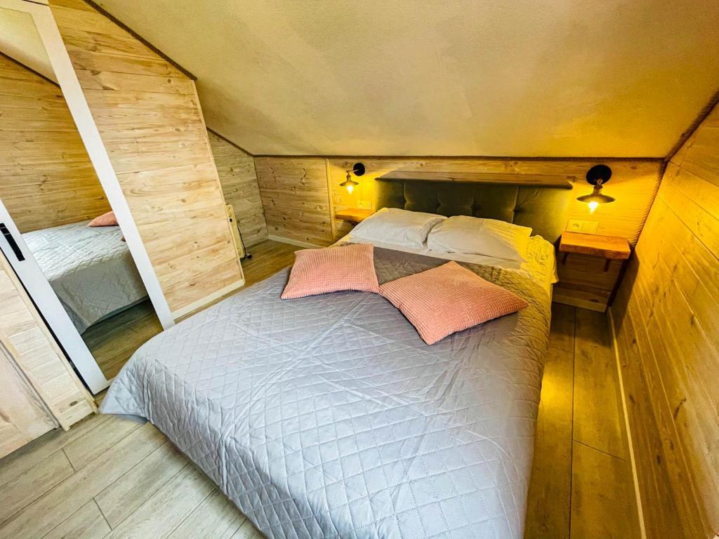 Posteľ alebo postele v izbe v ubytovaní Magic Home Łeba