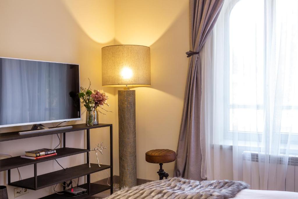 Postel nebo postele na pokoji v ubytování Villa Sokol