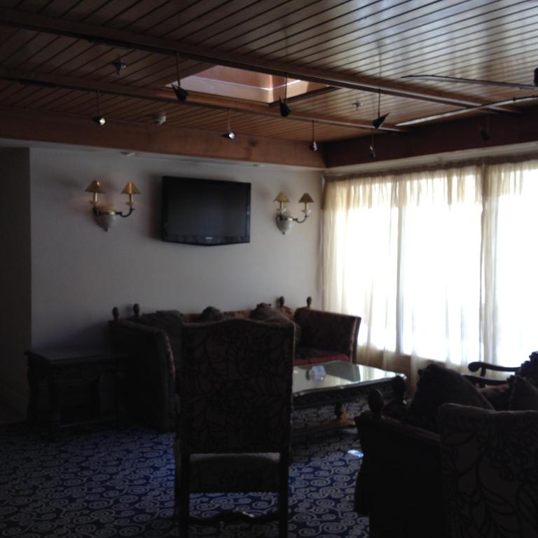 TV a/nebo společenská místnost v ubytování Amarante Pyramids Hotel