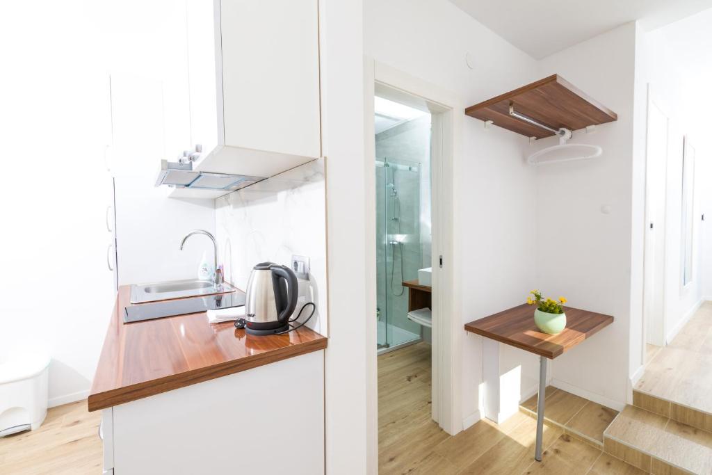 Kuchyň nebo kuchyňský kout v ubytování Stella Mare Eco Boutique House