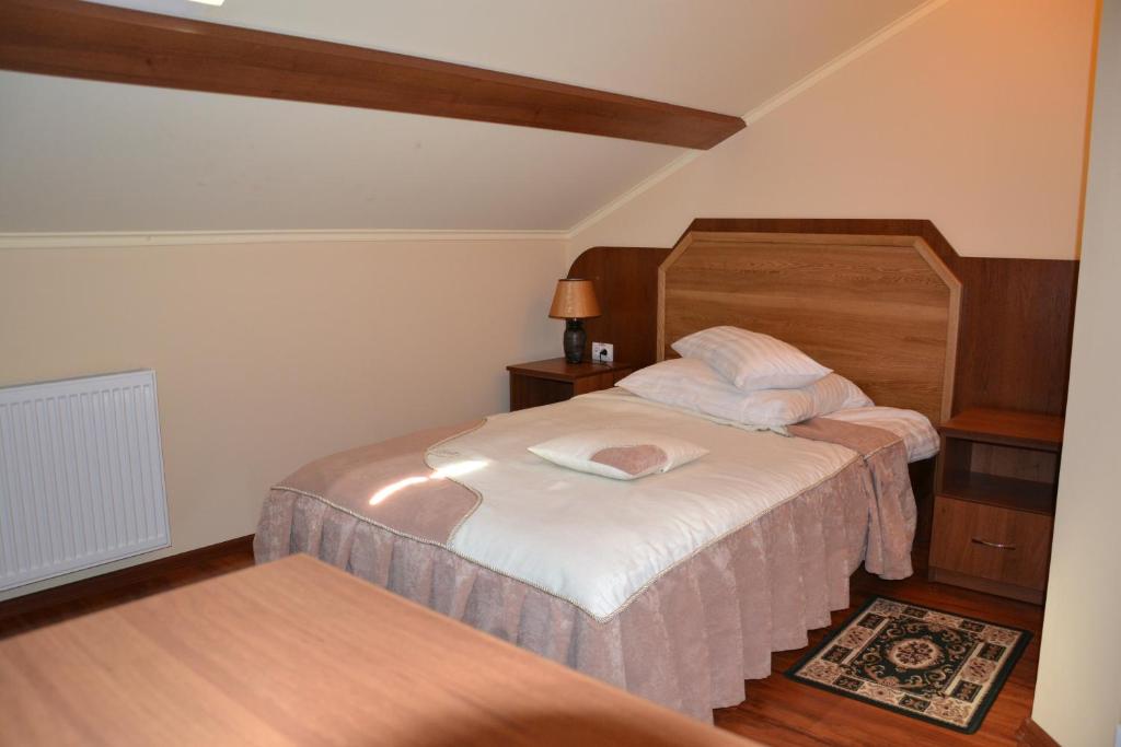 Postel nebo postele na pokoji v ubytování Kruiz Motel