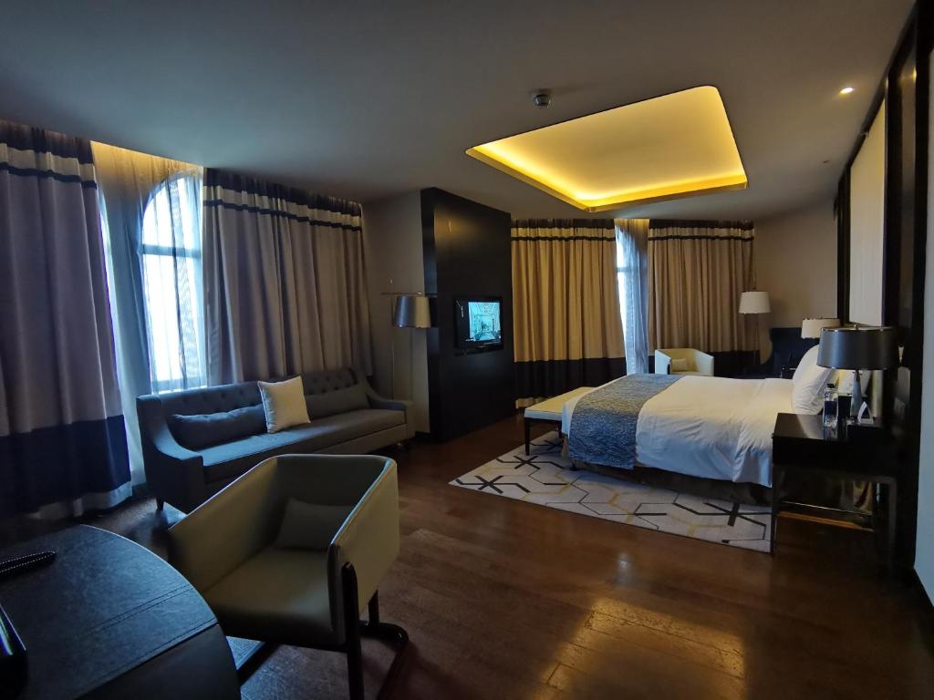 Postel nebo postele na pokoji v ubytování PRIMUS Hotel Wuhan Hannan