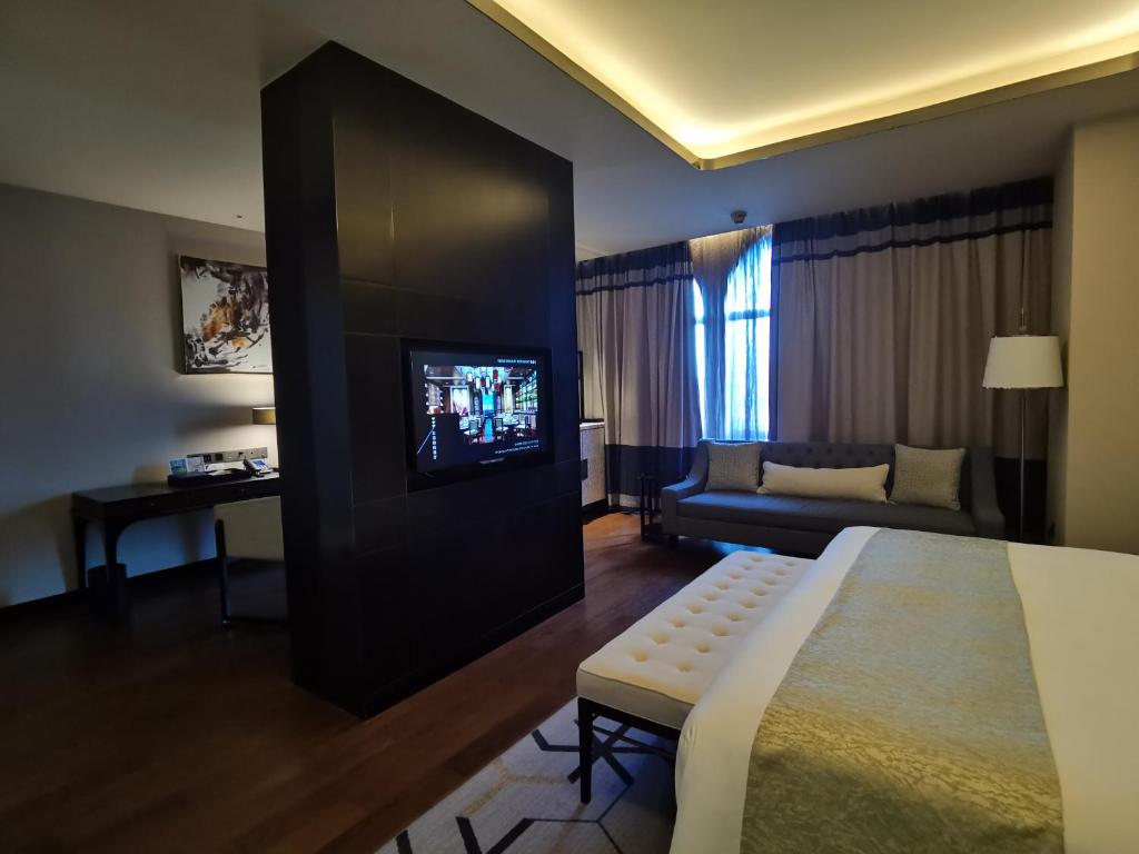 Postel nebo postele na pokoji v ubytování PRIMUS Hotel Wuhan Hannan