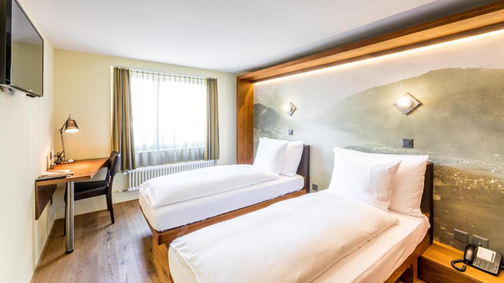 Postel nebo postele na pokoji v ubytování Boutique Hotel St. Georg