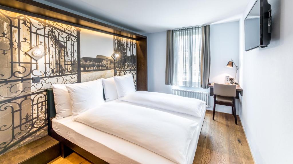 Postel nebo postele na pokoji v ubytování Boutique Hotel St. Georg