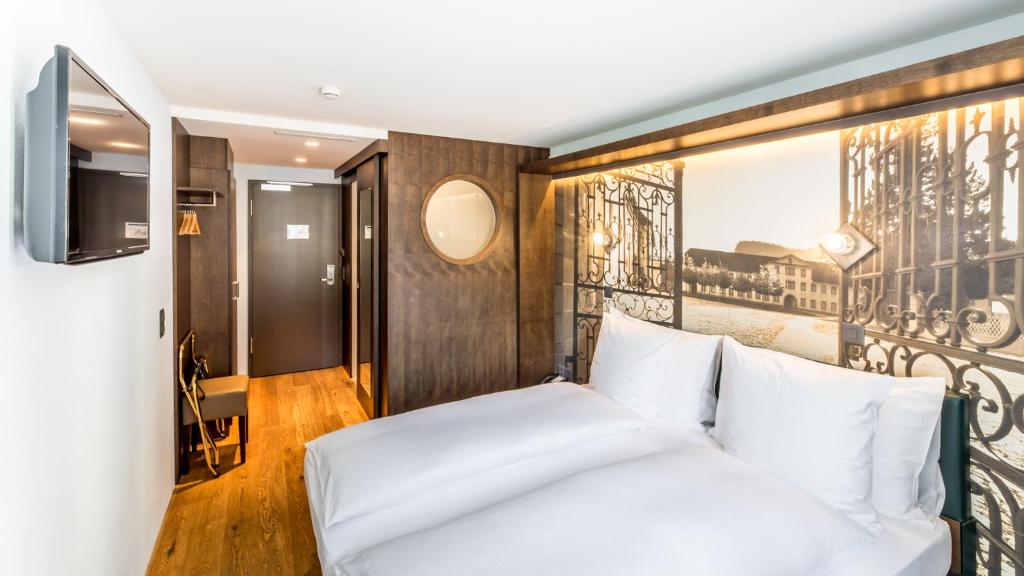Postel nebo postele na pokoji v ubytování Boutique Hotel St. Georg