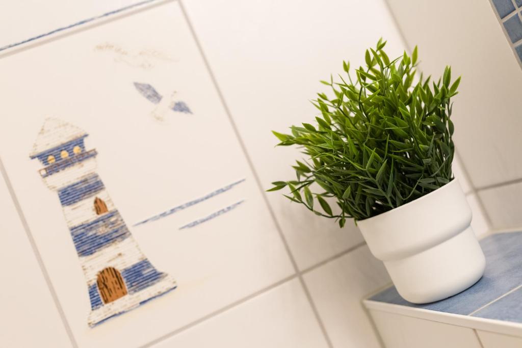 Ein Badezimmer in der Unterkunft Seemöwe - Villa Helene mit Meerblick in Top Lage