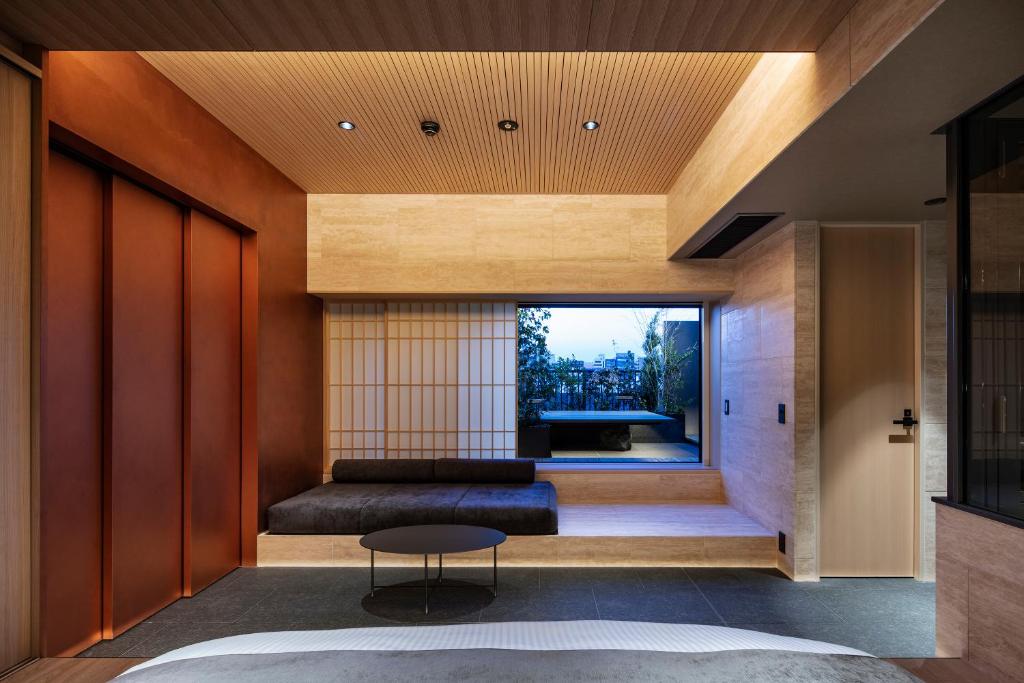 Postel nebo postele na pokoji v ubytování hotel tou nishinotoin kyoto