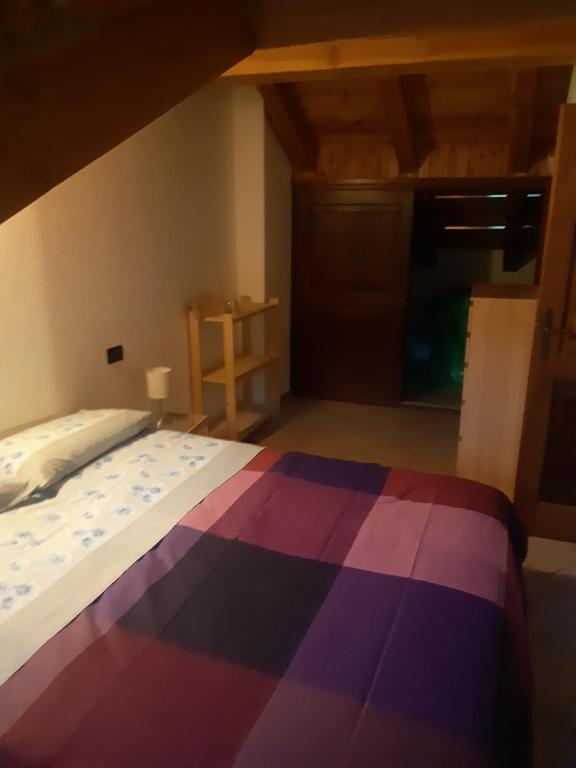 A bed or beds in a room at Casa Cheney