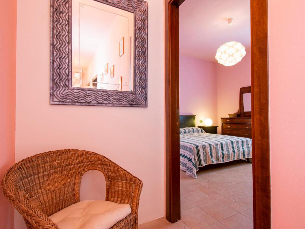 Łóżko lub łóżka w pokoju w obiekcie Holiday Home Il Sorriso by Interhome