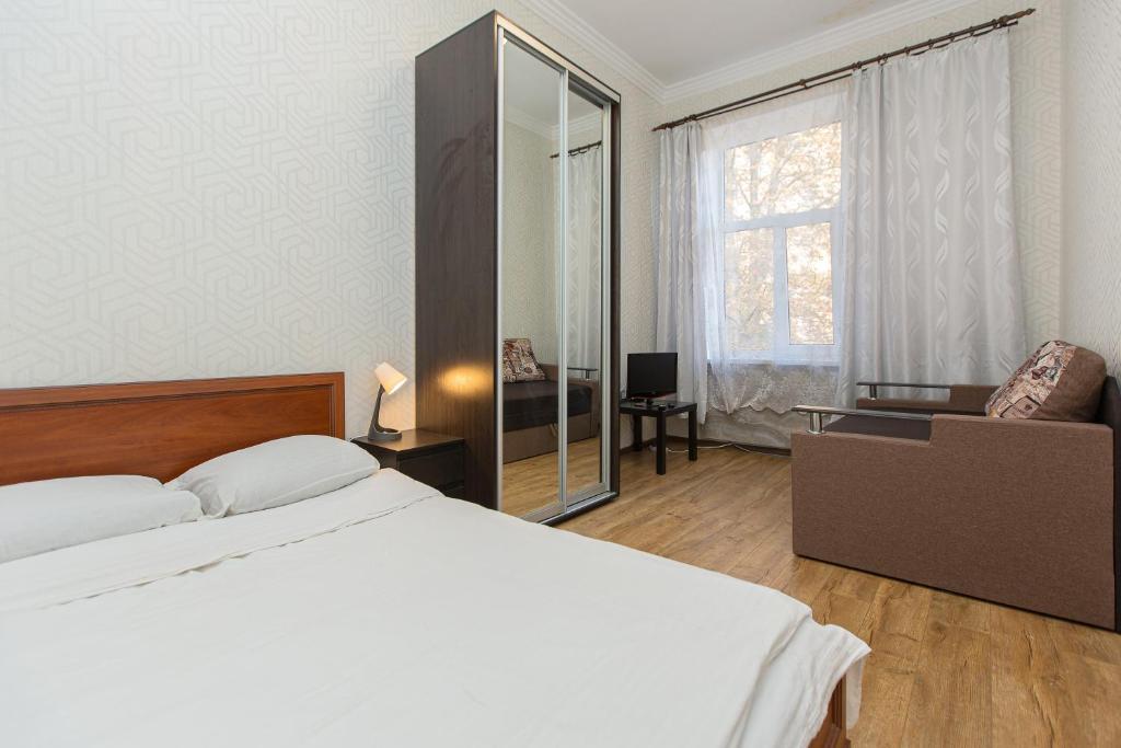 Кровать или кровати в номере Квартира подобово вулиця Сходова 3 бічна Ужгородської біля Високого замку
