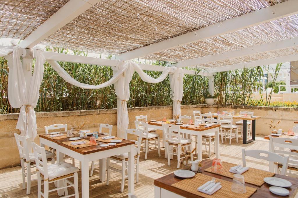 Canne Bianche Lifestyle Hotelにあるレストランまたは飲食店